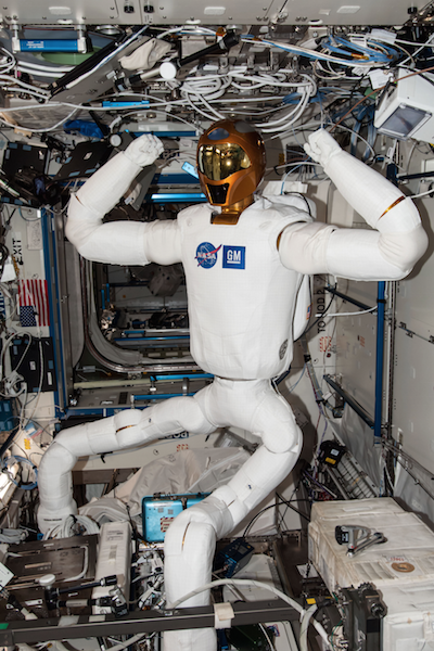 Robonaut2 climbing in the International Space Station.