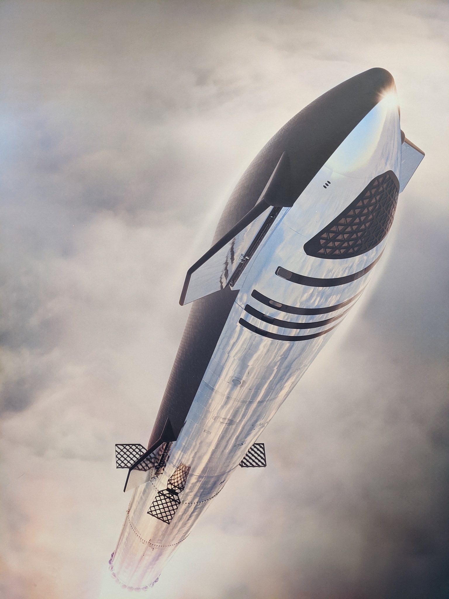 SpaceX's new render of Starship in flight with changes.