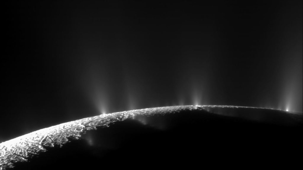 plumes of water and ice from saturn's moon Enceladus captured by NASA cassini spacecraft